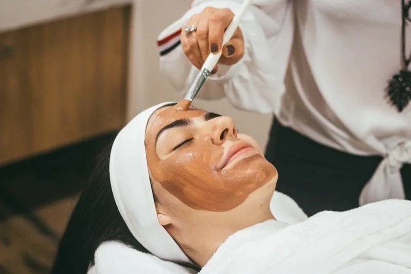 Client receiving a relaxing facial treatment